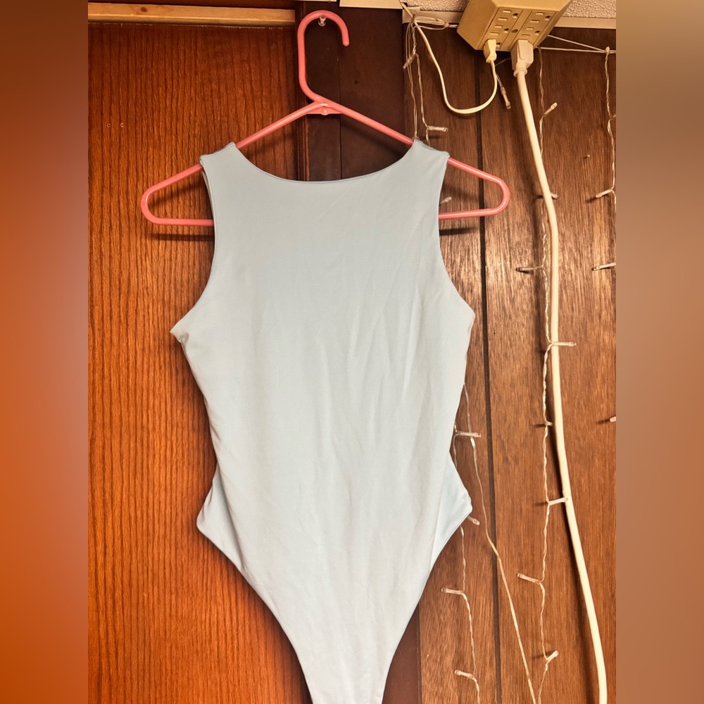 Women’s blue bodysuit